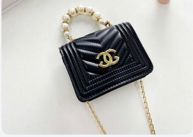 Luxury cute girls small mini designer hand bag is a perfect accessory.